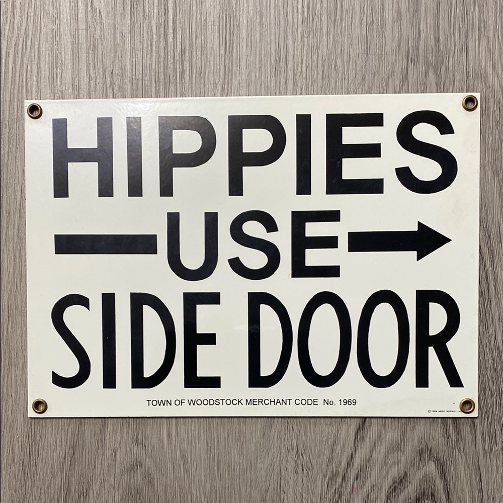 “Hippies Use Side Door” Woodstock Metal Sign
